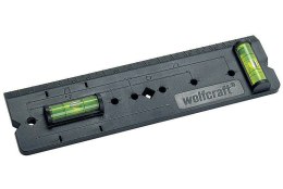Szablon do wymiarowania otworów pod puszki prądowe Wolfcraft o standardowych odstępach 57, 71 oraz 91 mm. 2 zintegrowane poziomi